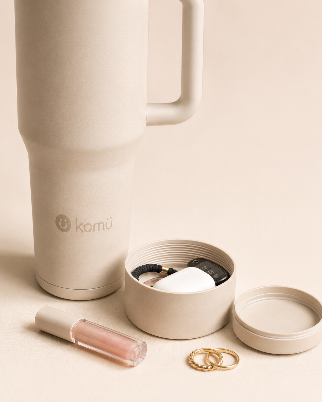 Komü hidden storage compartment holding small essentials for the hydration storage audience card